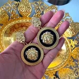 Gold Leon round mishka earrings